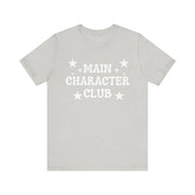Gray t-shirt with 'MAIN CHARACTER CLUB' text and stars on a white background