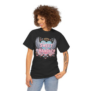 Woman wearing a black t-shirt with a colorful graphic design on a white background