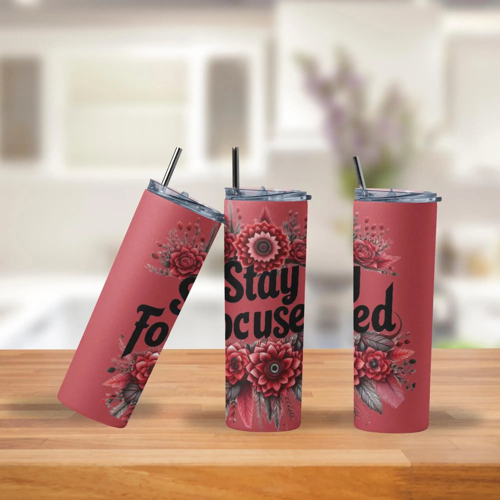20oz Stay Focused stainless steel tumblers – pink motivational drinkware with red floral design, insulated cups for coffee or tea.